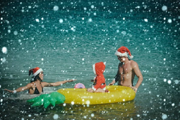 Santa criança, pais no Natal . — Fotografia de Stock