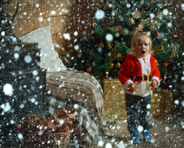 Christmas surprised child read wish letter.