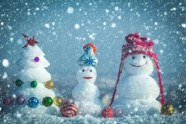 Snow sculptures on blue sky background