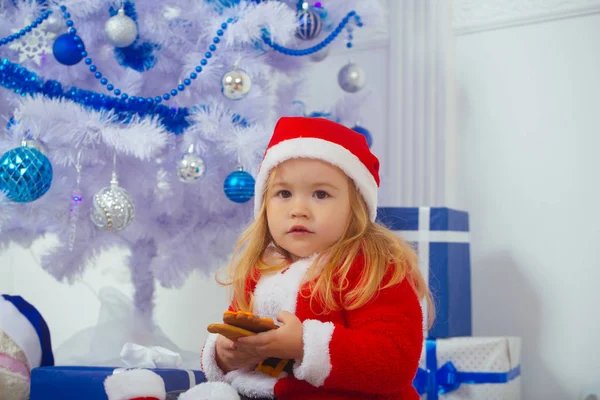 Santa claus kid with present box, black Friday.