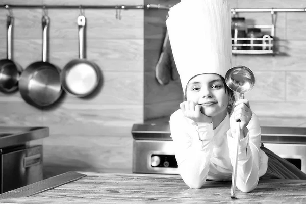 Small girl with ladle — Stock Photo, Image