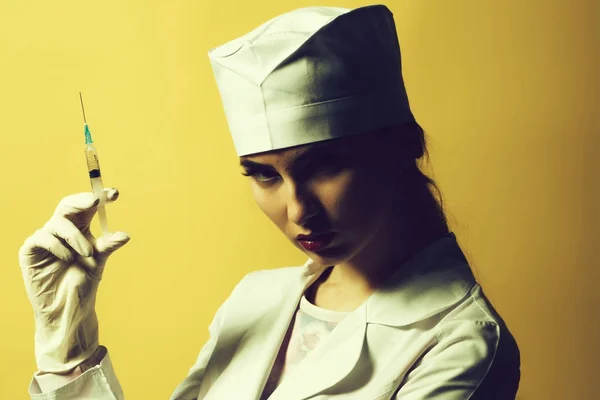 Female doctor with syringe — Stock Photo, Image