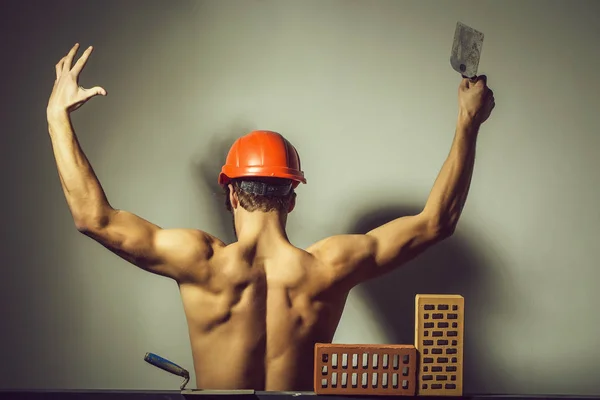 Sexy muskularne człowiek budowniczy — Zdjęcie stockowe