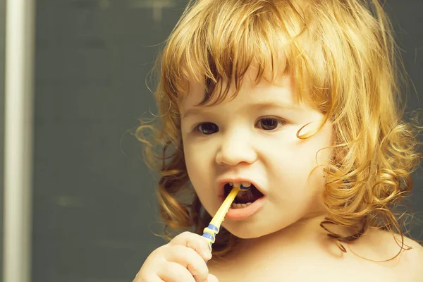 Baby boy with teeth brush — Stock Photo, Image