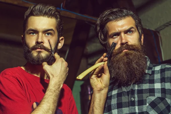 bearded barber men with razor
