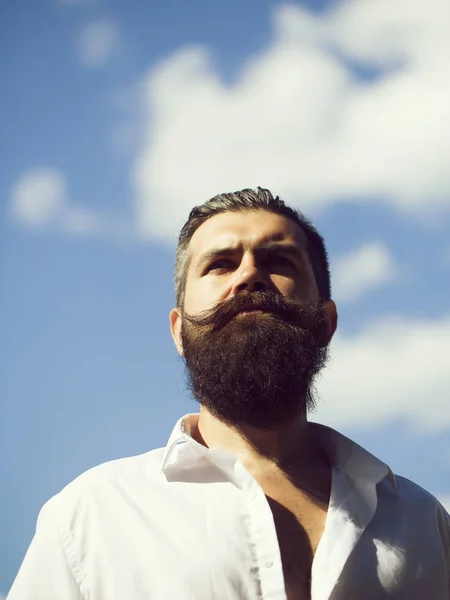 Bearded man on blue sky — Stock Photo, Image