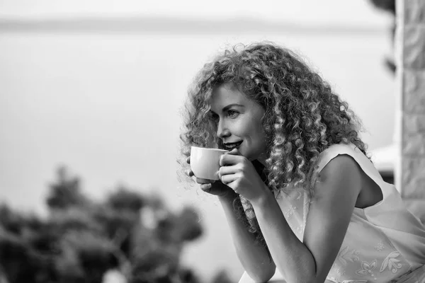 pretty woman with coffee cup