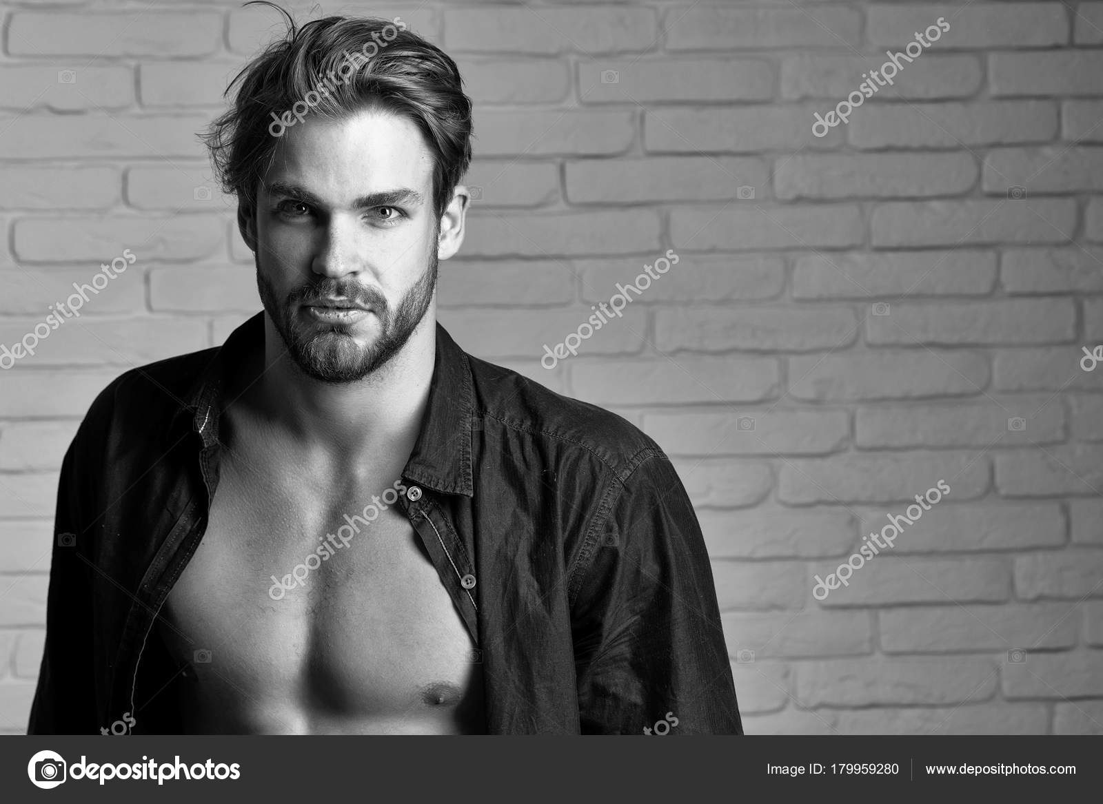 Sexy handsome muscular man Stock Photo by 179959280