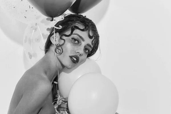 Pretty girl with party balloons