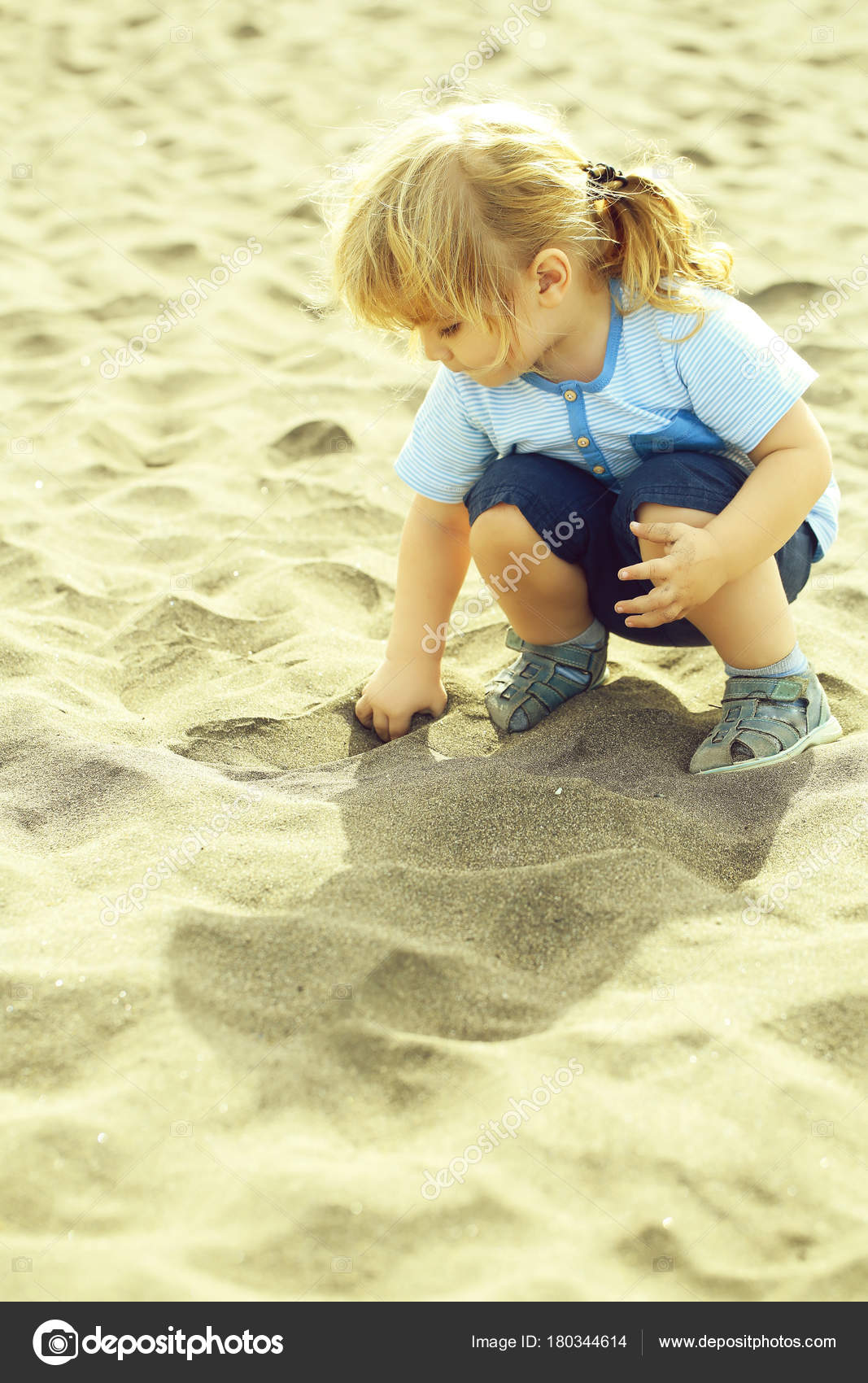 Cute Baby Boy Blond Hair Ponytail Blue Tshirt Shorts Plays Stock
