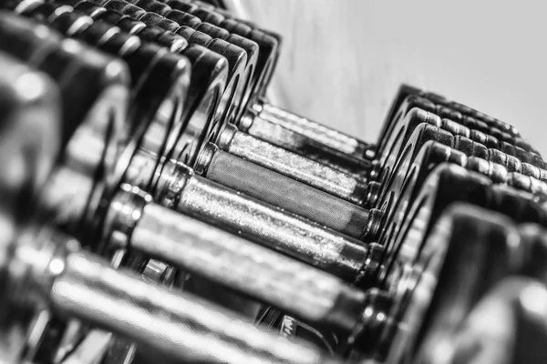 Metallic or steel dumbbells — Stock Photo, Image