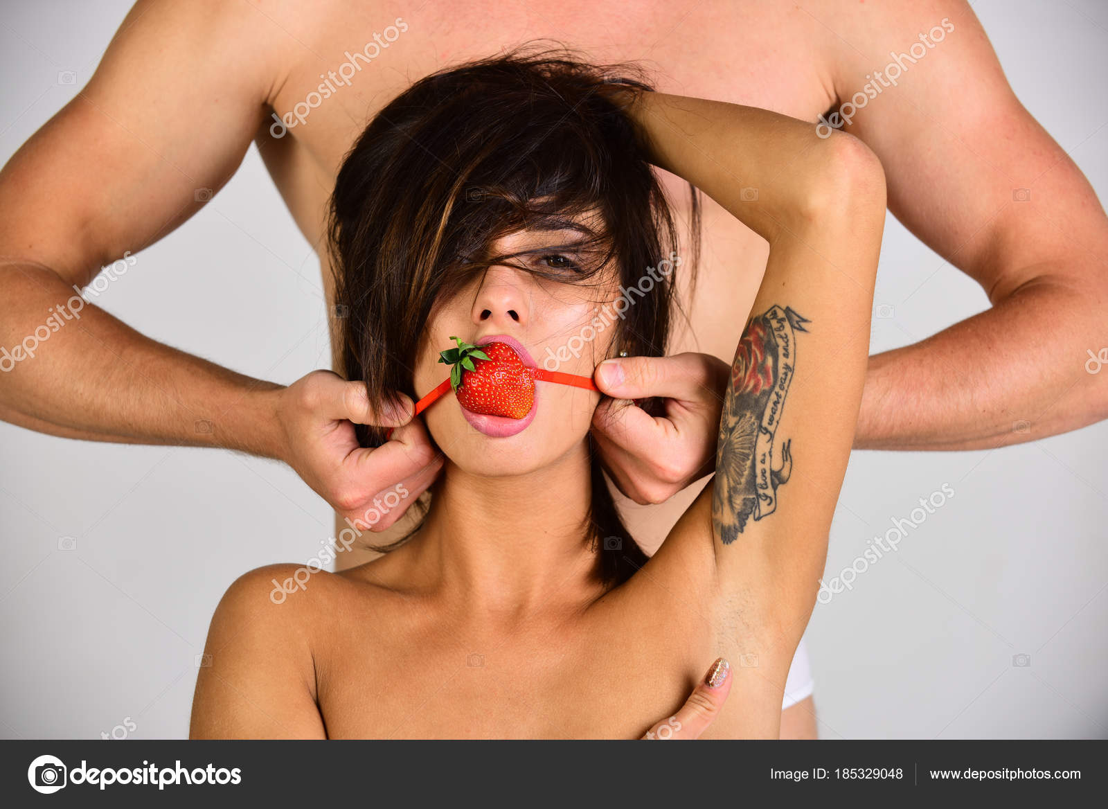 Man dominating woman, oral sex, temptation photo