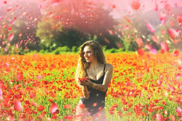 Happy woman in flowers. Spring flowers. — Stock Photo, Image