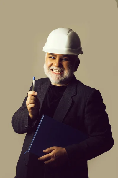 Man in hard hat smiles — Stock Photo, Image