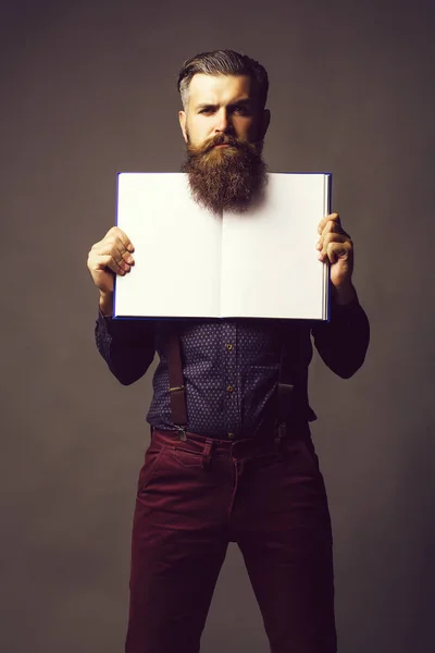 Man holds open journal — Stock Photo, Image