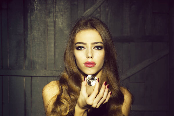 Pretty woman with precious gem