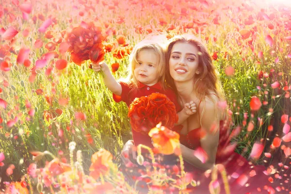 Family, spring, vacation. Family in spring flover meadow.