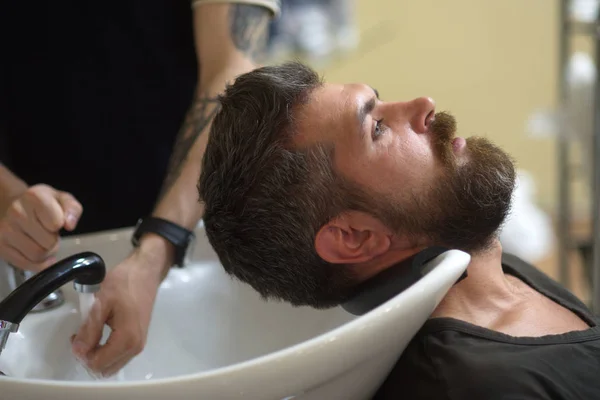 Bearded man mustache in barber shop