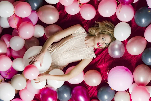 Pin up woman in balloons, round pot blush. — Stock Photo, Image
