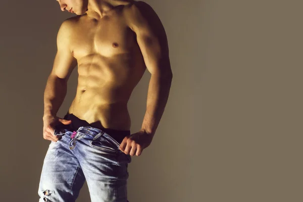 Body, naked male in unbutton blue jeans — Stock Photo, Image