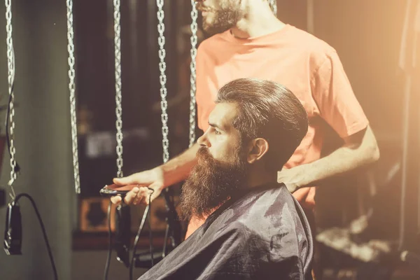 Handsome bearded man has hairstyle — Stock Photo, Image