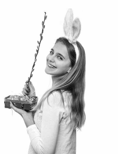 Happy easter girl in bunny ears with golden eggs, willow — Stock Photo, Image