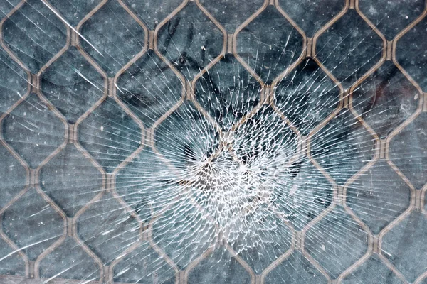 Cracked window or glass as a spider web. — Stock Photo, Image