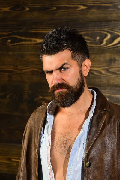 Haircut of bearded man, archaism. Haircut and trendy hipster beard of young man in leather jacket — Stock Photo, Image