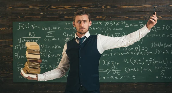 Young Student His Hands Spread Scales Pile Books One Hand — Stock Photo, Image