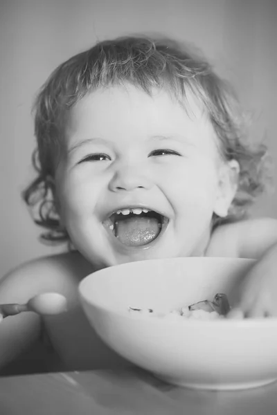 Portrait of funny boy eating — Stock Photo, Image