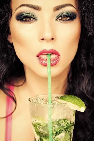 Attractive lady drinking mojito — Stock Photo, Image