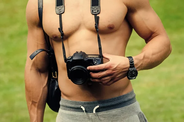 Camera hang on naked torso — Stock Photo, Image