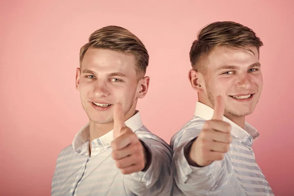 Twins wearing blue shirts — Stock Photo, Image