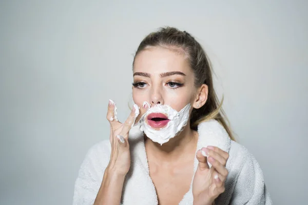 Girl Busy Face Bathrobe Covering Face Foam Shaving Grey Background — Stock Photo, Image