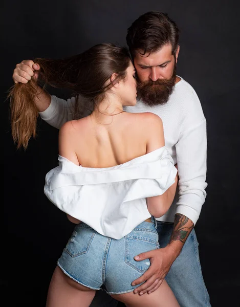 Sensual girl moaning with desire caressing boyfriend during foreplay or making love. Passionate horny woman with lover feeling pleasure having sex. Couple in retro old style. — Stock Photo, Image