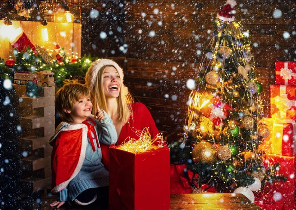 Mom and kid play together christmas eve. Family holiday. Happy family. My dear baby santa. Mother and little child boy adorable friendly family having fun. Family having fun at home christmas tree — Stock Photo, Image