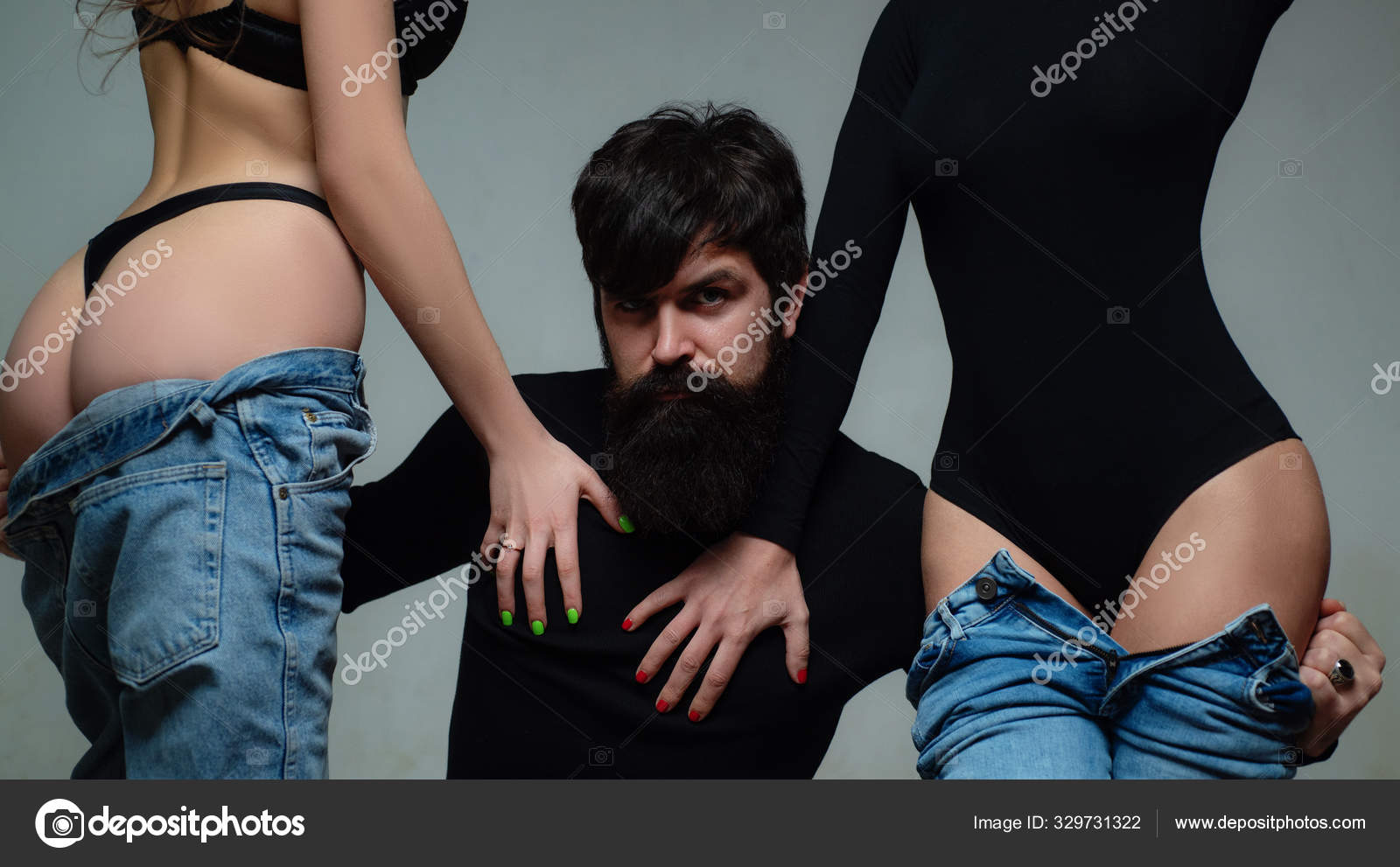 Threesome concept. Three people having group sex together. One man and two sexy women. Polygamy or bigamy. Swinger, orgy or trio having sex. Bisexual lady photo pic