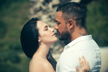 Sensual couple kiss. Horny hot young lady embracing lover moaning. Enjoying the company of each other. Sensual couple enjoying intimacy. Making love to young lover.