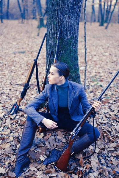 successful hunt. hunting sport. woman with weapon. Target shot. girl with rifle. chase hunting. Gun shop. female hunter in forest. military fashion. achievements of goals. Hunting season