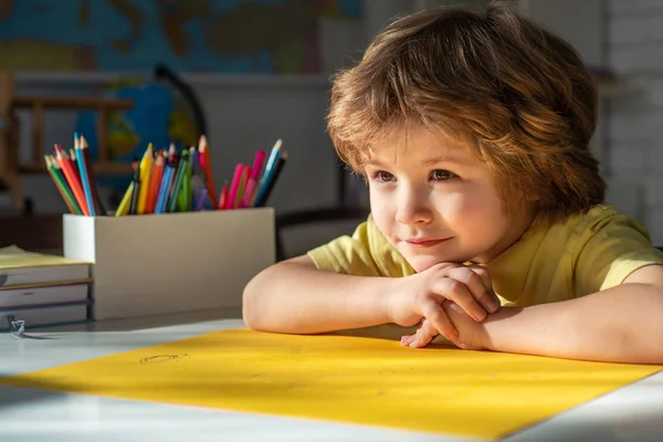 Cute face of pupil, close up. Elementary school classroom. Child home studying and home education. Schoolkid or preschooler learn. — Stockfoto