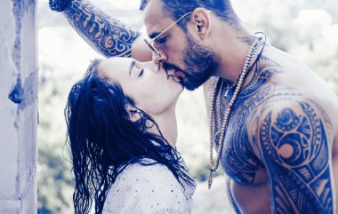 Passion love couple. Romantic moment. Handsome muscular guy and amazing sexy woman. Cosmopolitan couple. Love and flirt. Muscular man and fit slim young female kissing. Couple goals. clipart