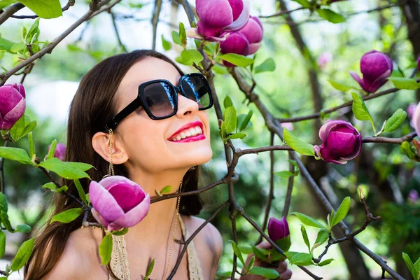 Happy Fashion Woman in Sunglasses. Smiling Trendy Girl in Summer. Happy girl enjoy spring. Gorgeous brunette girl. Beautiful girl.