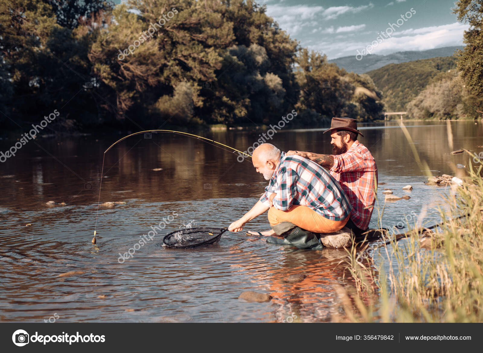 https://st3.depositphotos.com/3584053/35647/i/1600/depositphotos_356479842-stock-photo-father-and-adult-son-fishing.jpg