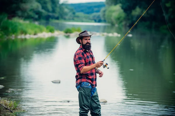 Male hobby. Ready for fishing. Relax in natural environment. Trout bait. Bearded elegant man. Man relaxing nature background. Strategy. Hobby sport activity. Activity and hobby. Catching and fishing. — Stock Photo, Image