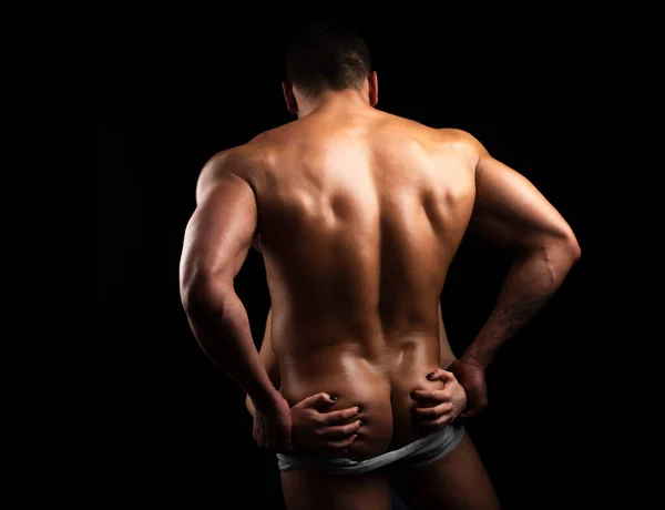 Perfect man ass in a sexy panties. Big sexy man ass with womans hand. Sexy man ass. Sexy hunky man, — Stock Photo, Image