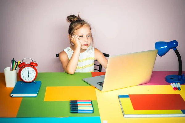 Kid boring in school. Tired pupil girl schooling work. Elementary school classroom. Home schooling and homework.