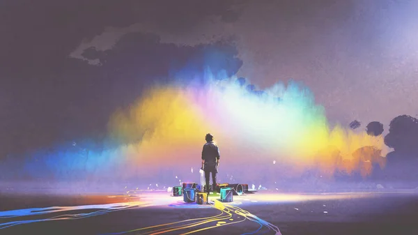 Homem com baldes de tinta fica na frente da nuvem colorida — Fotografia de Stock