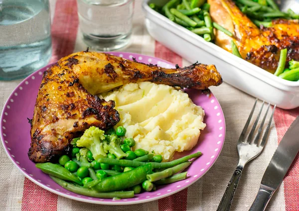 Roasted chicken legs with adjika and tomato sauce — Stock Photo, Image