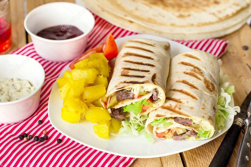 Shawarma wrap with beef and vegetables