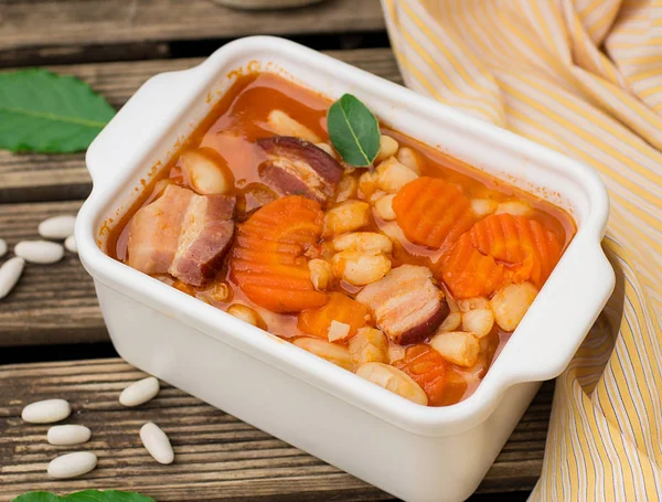 Haricot bean stew with smoked meat and carrots — Stock Image Haricot bean stew with smoked meat and carrots Stock Image